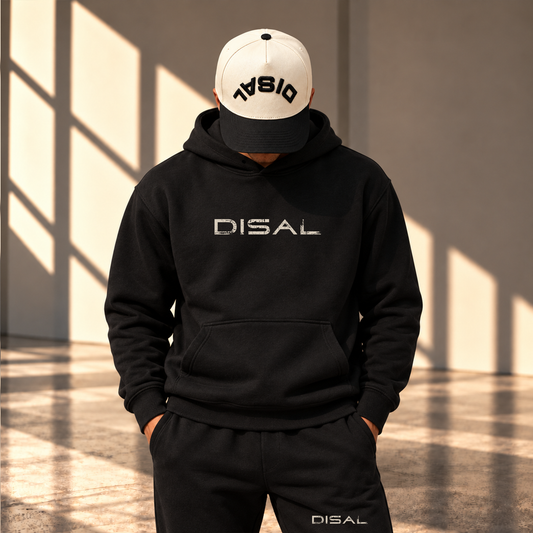 Model wearing ivory hat with black upside down logo